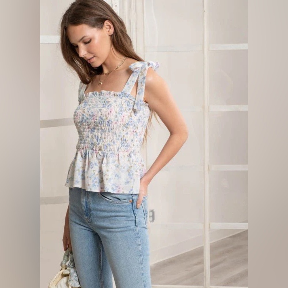 E & M floral smocked peplum tank top. Size S.